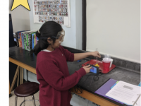 student working at lab counter