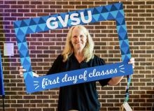 Deanna with GVSU frame "first day of classes"