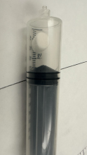 Close-up of mini marshmallow in a syringe