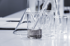 beakers, disposable pipettes and a glass funnel