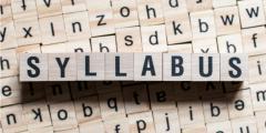Scrabble tiles spelling out "syllabus"