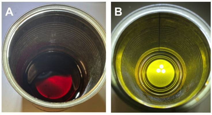 Reaction of a tinplate plate can with molecular iodine to form SnI4. Panel A shows the initial mixture (iodine dissolved in toluene), Panel B shows the reaction mixture after 24 hours.