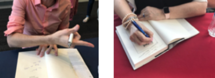 2 authors autographing books