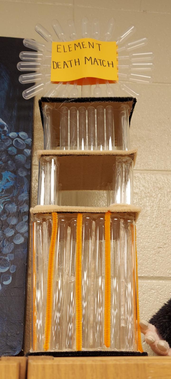 March Madness Element Trophy created out of 3 tiers of test tubes and pipettes