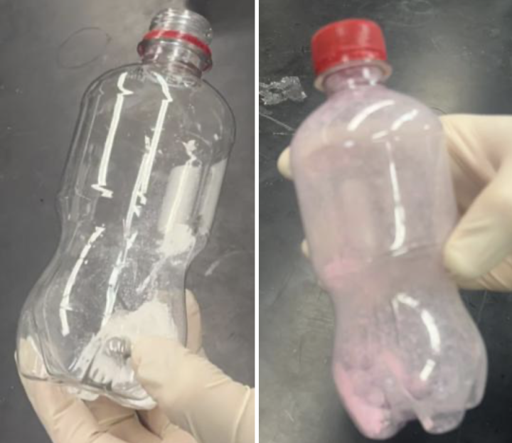 Grinding solid phenolphthalein and solid magnesium hydroxide together using iron spheres in a shaken soda bottle.