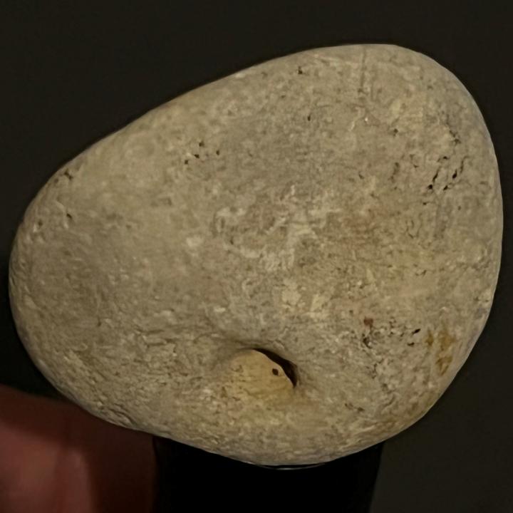 Laser interactions with opaque limestone and translucent quartzite, and sunlight illuminating quartz pebbles.