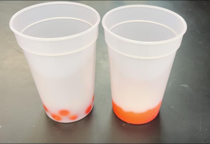 Larger and smaller glass spheres added to thermochromic plastic cups to make them change color
