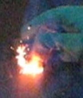 Palladium on carbon that has been exposed to hydrogen, producing orange sparks when exposed to air