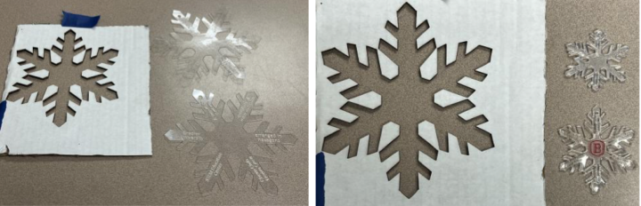 Shrinkable polystyrene cut into snowflake shapes and inscribed with words