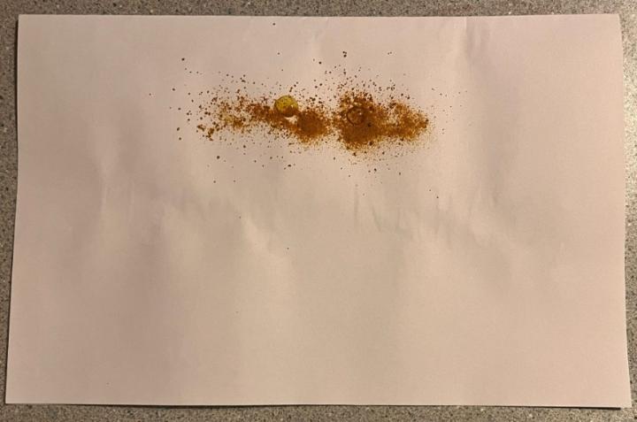tumeric sprinkled on paper
