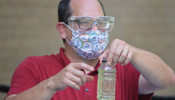 Dean Campbell holding a bottle 