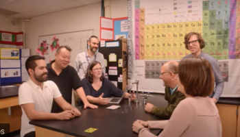 ACCT team members gathered around a table