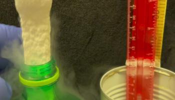 Rectangular polystyrene foam stick shrunken by liquid nitrogen fits into round hole