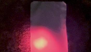 Still frame from video showing glowing hot palladium foil