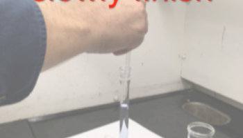 pipetting into a volumetric flask
