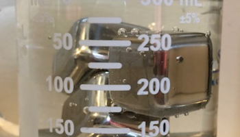 Beaker of ChemEd X chilling cubes