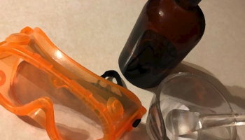 gooles, mortar/pestle and brown bottle