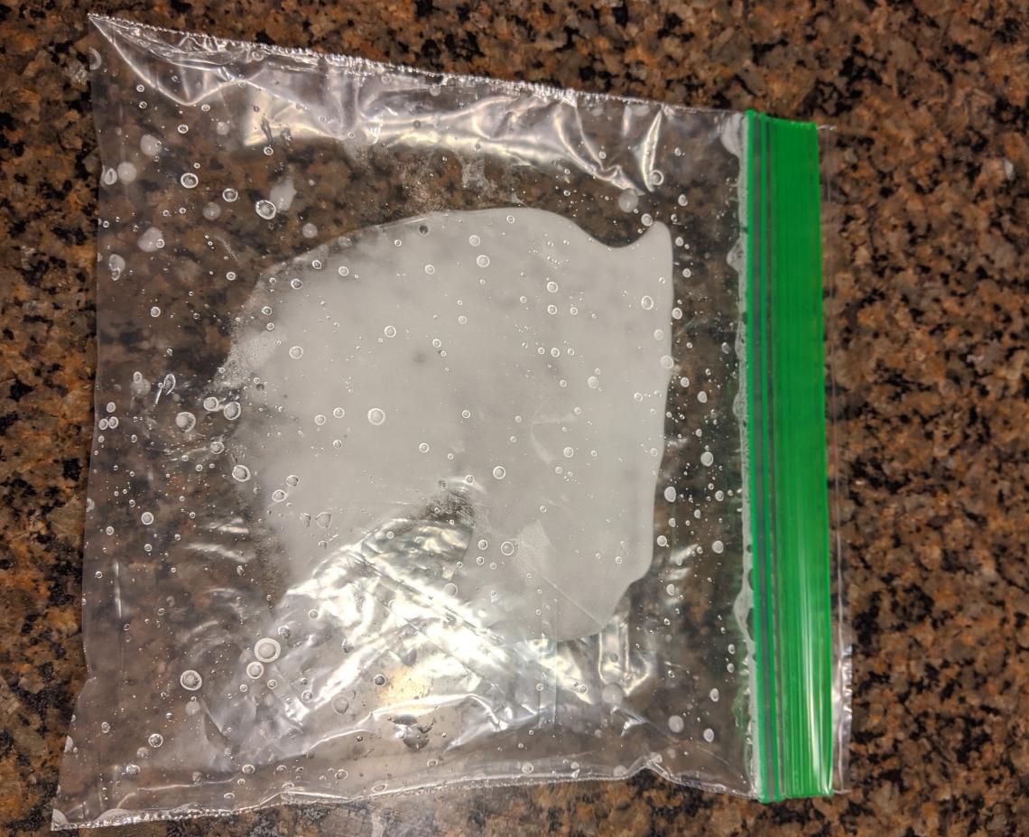 clear plastic sandwich bag with white powder inside