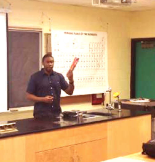 Jason Bradshaw in front of his classroom