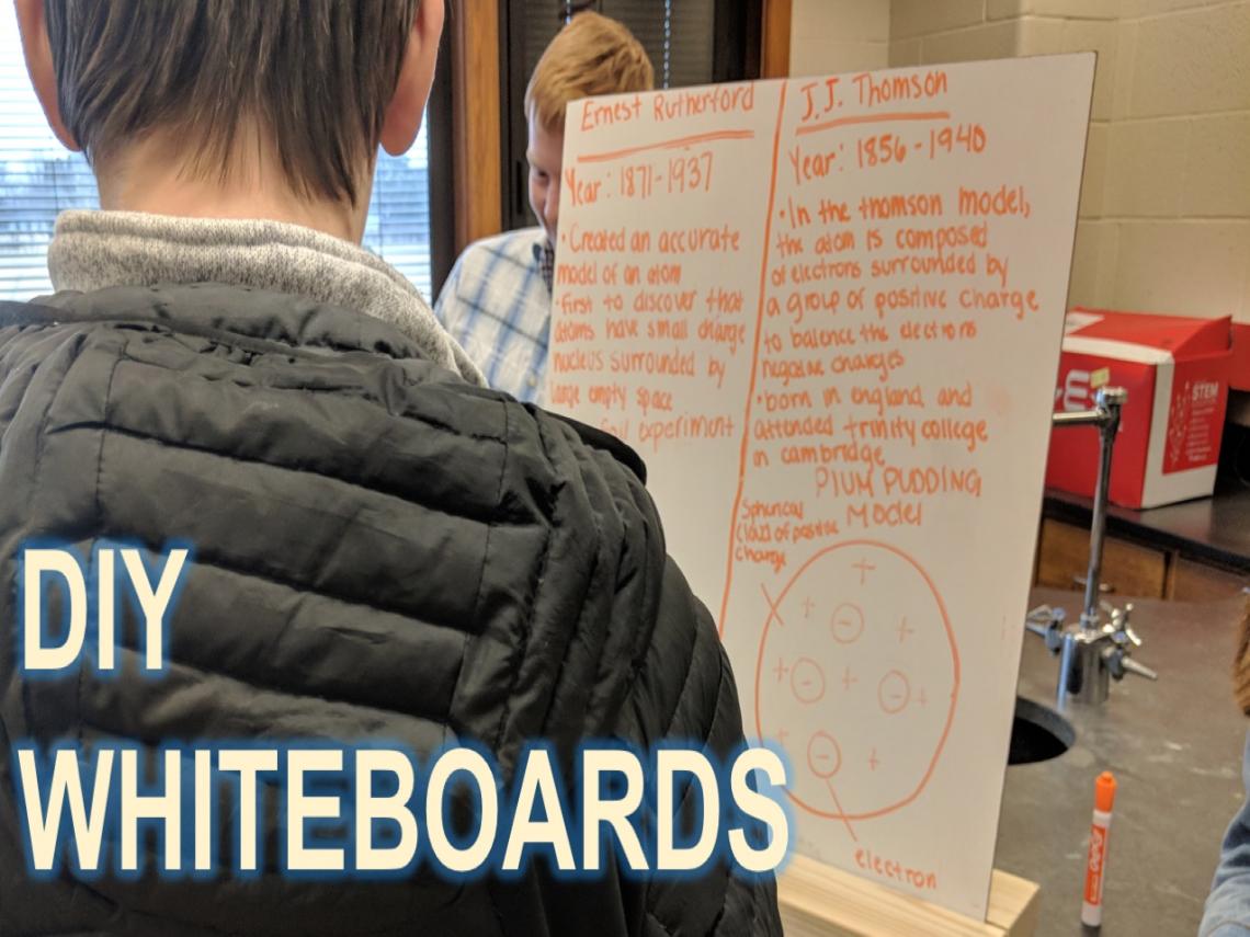 student looking at whiteboard, text "DIY Whiteboards"