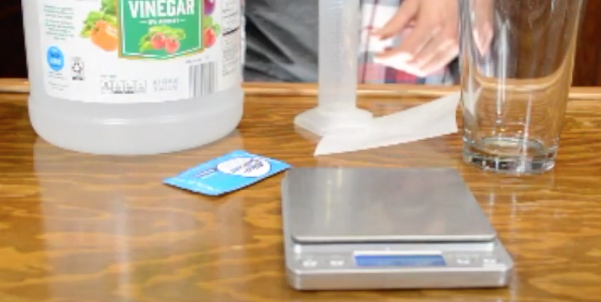 vinegar, Alka-Seltzer tablet, graduated cylinder, balance, glass container
