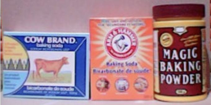 three common antacid component product containers: Magic, Arm &amp; Hammer, Cow Brand