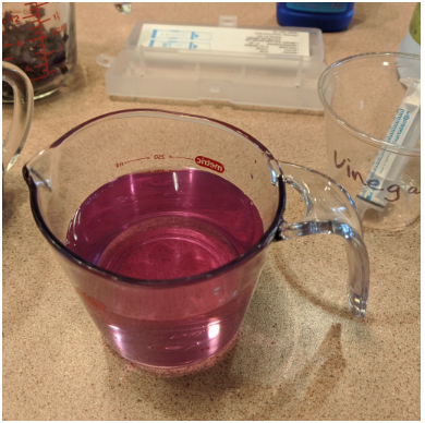 clear violet solution at end of titration