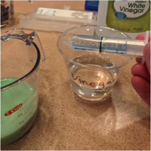 vinegar in syringe