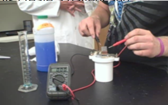students working voltaic cell in the lab